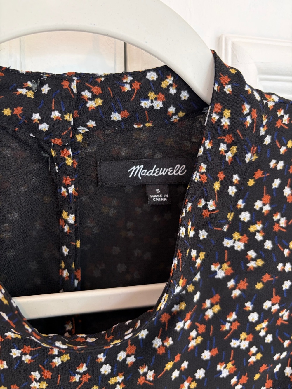 Madewell Black Blouse with White, Orange & Blue Floral Stars